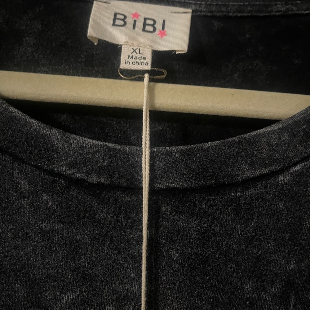 BiBi acid washed fringed tee.